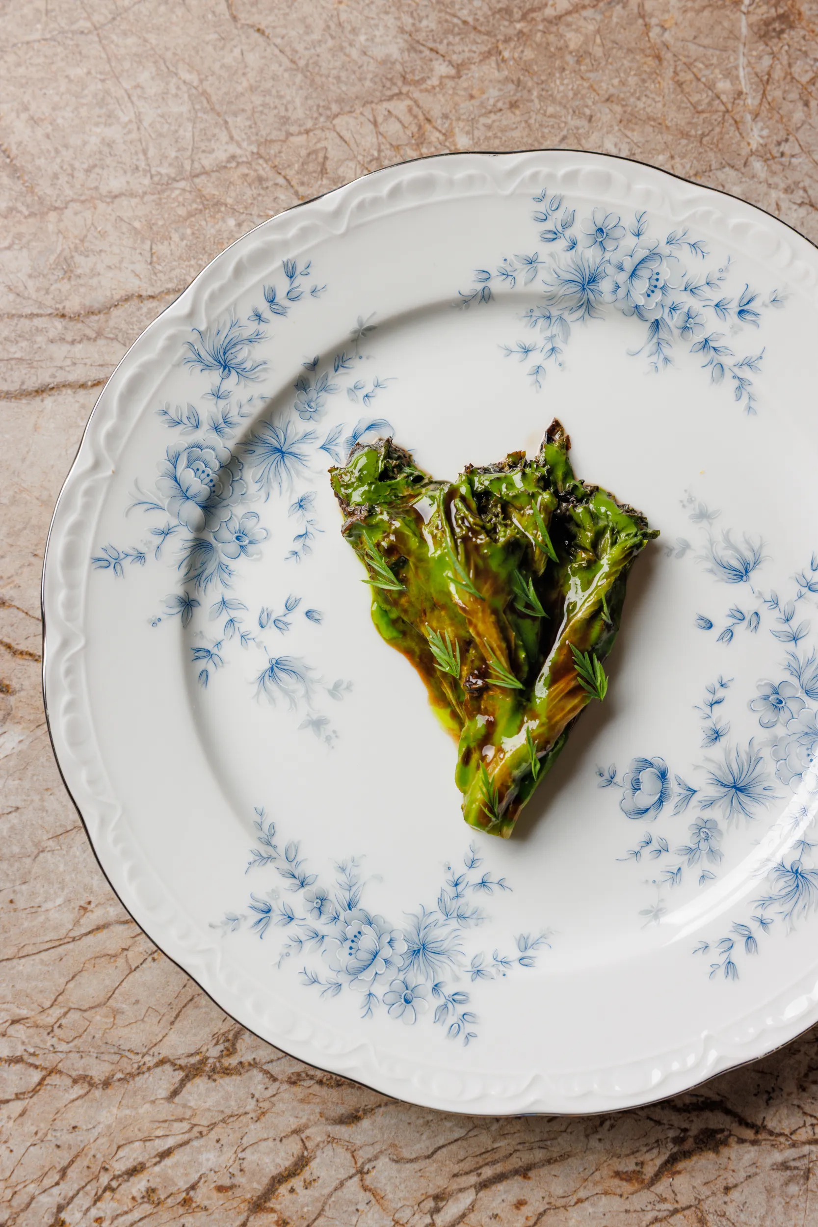 Charred greens on a blue-floral vintage plate - Sintesi, Ariccia, Italy