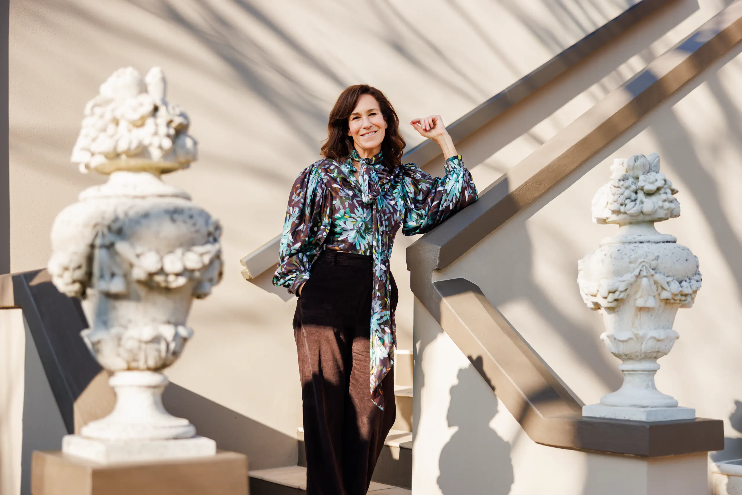 Lara Gilmor pose in the garden of Casa Maria Luigia, Modena, Italy